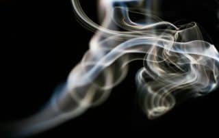 White smoke on a black background